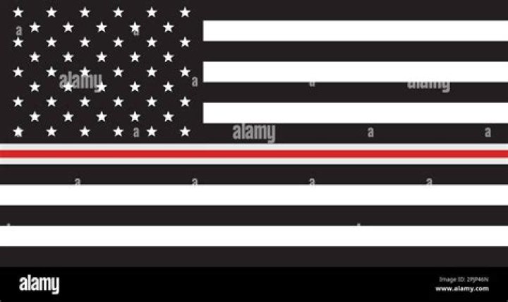 What does the black and white American flag mean with a red stripe?