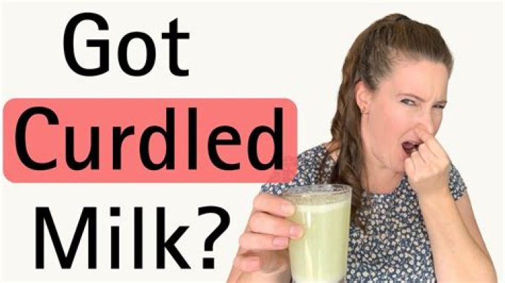 Why do babies vomit curdled milk?